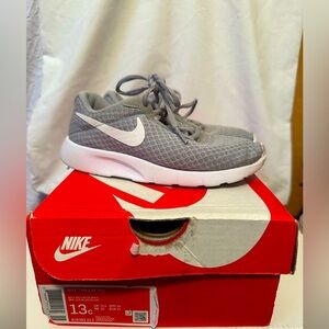Used Gray and White Nike Tanjuns Size 13c.